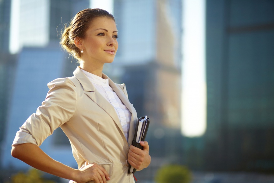 portrait-of-cute-young-business-woman-outdoor-over-building-background.jpg